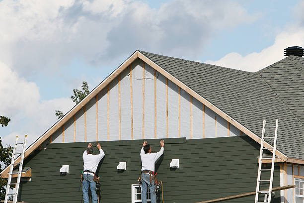 Professional Emergency Siding Repair technician working in Worthington, IN